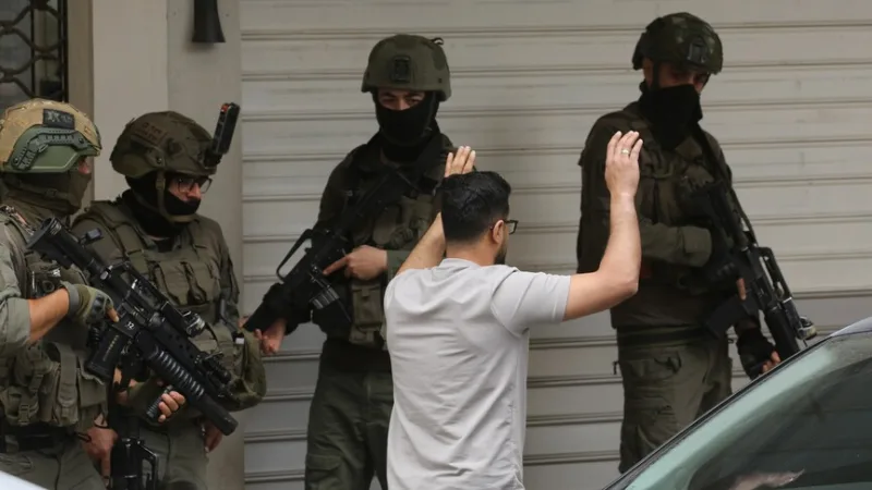 Four Palestinians were injured and two were detained during Israeli military raids in the West Bank