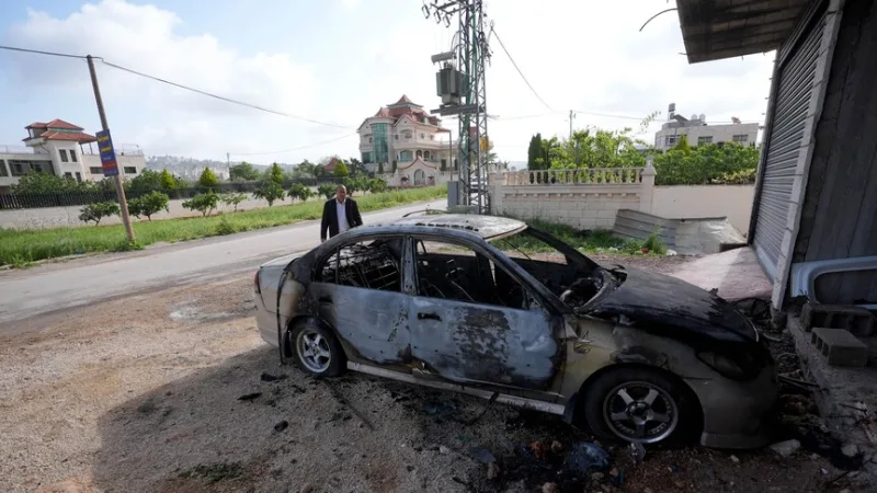 Israelis who have seized Palestinian lands set a vehicle on fire in the West Bank